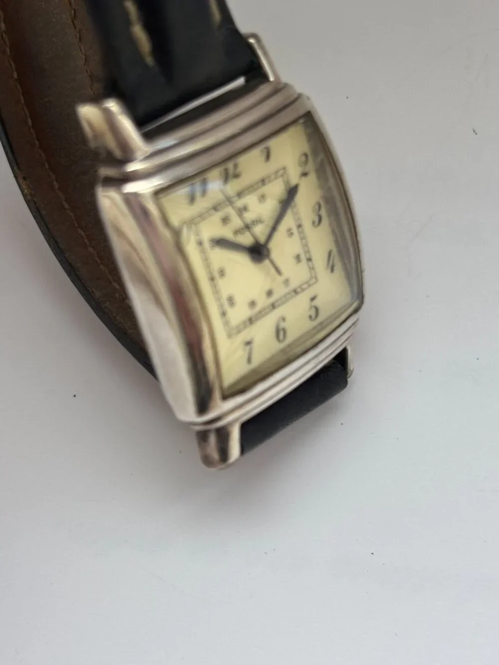 Vintage Fossil watch in Art Deco style with silver bezel and square face